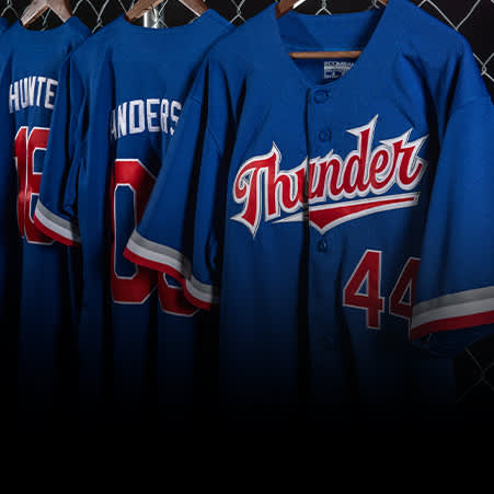 blue and red baseball jerseys