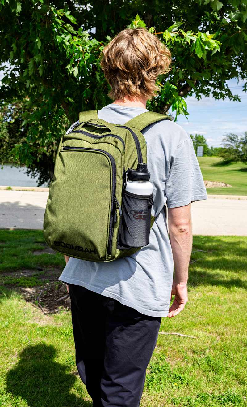 Reilly wearing the Cohort Backpack