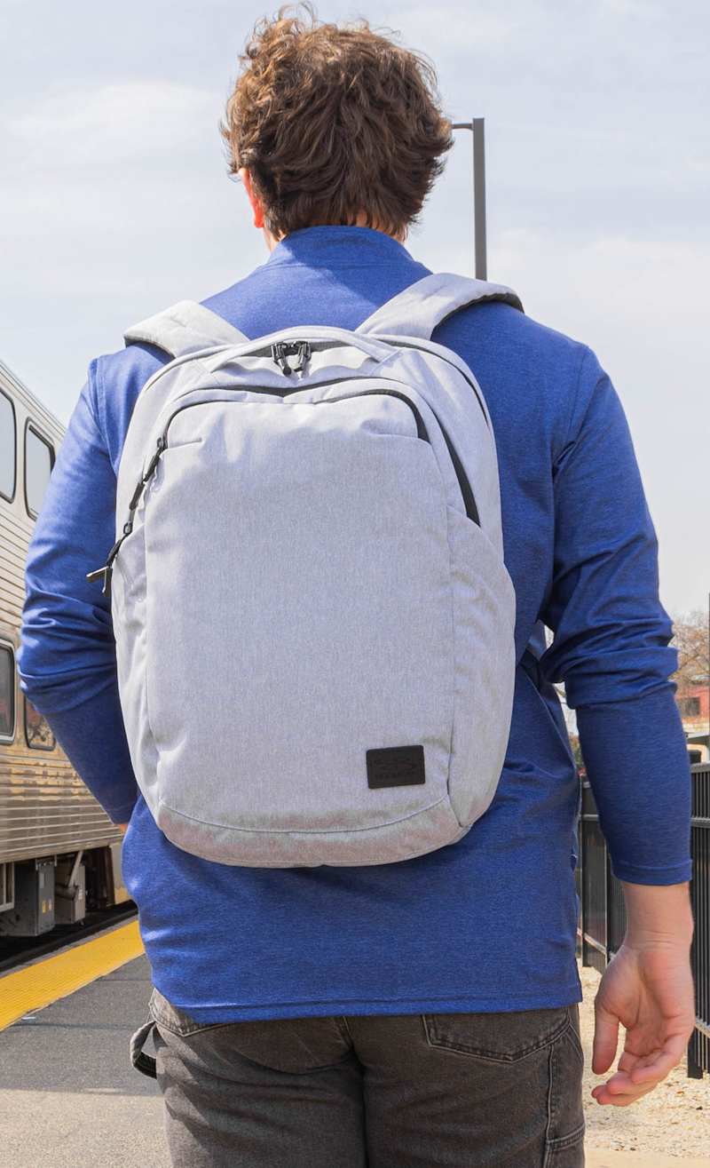 Male model wearing the Commuter Backpack