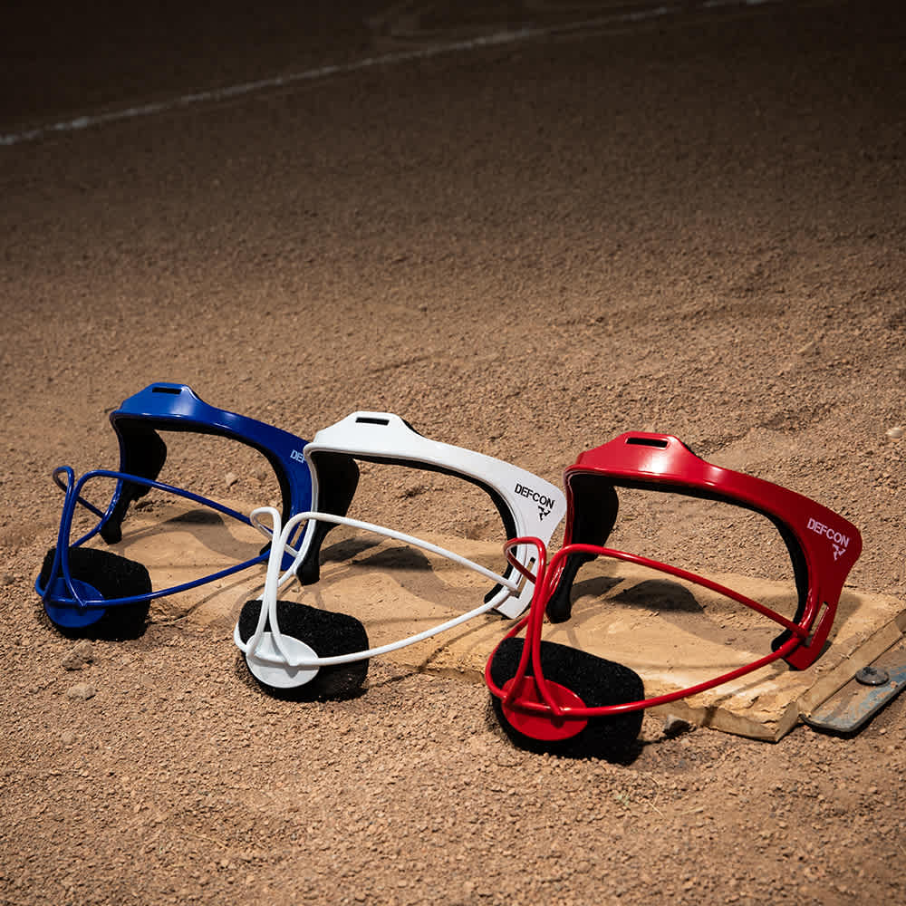 Boombah DEFCON Fielding Masks on pitching mound