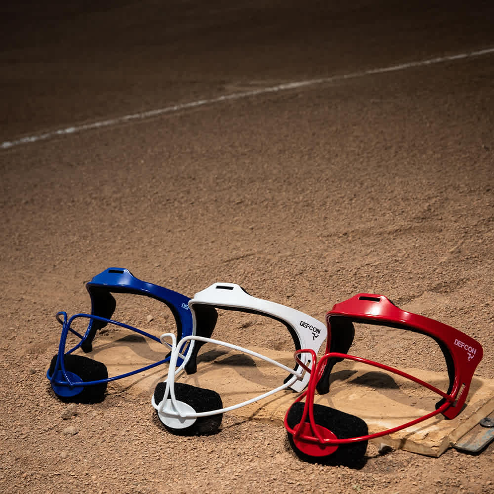 Boombah DEFCON Fielding Masks on pitching mound